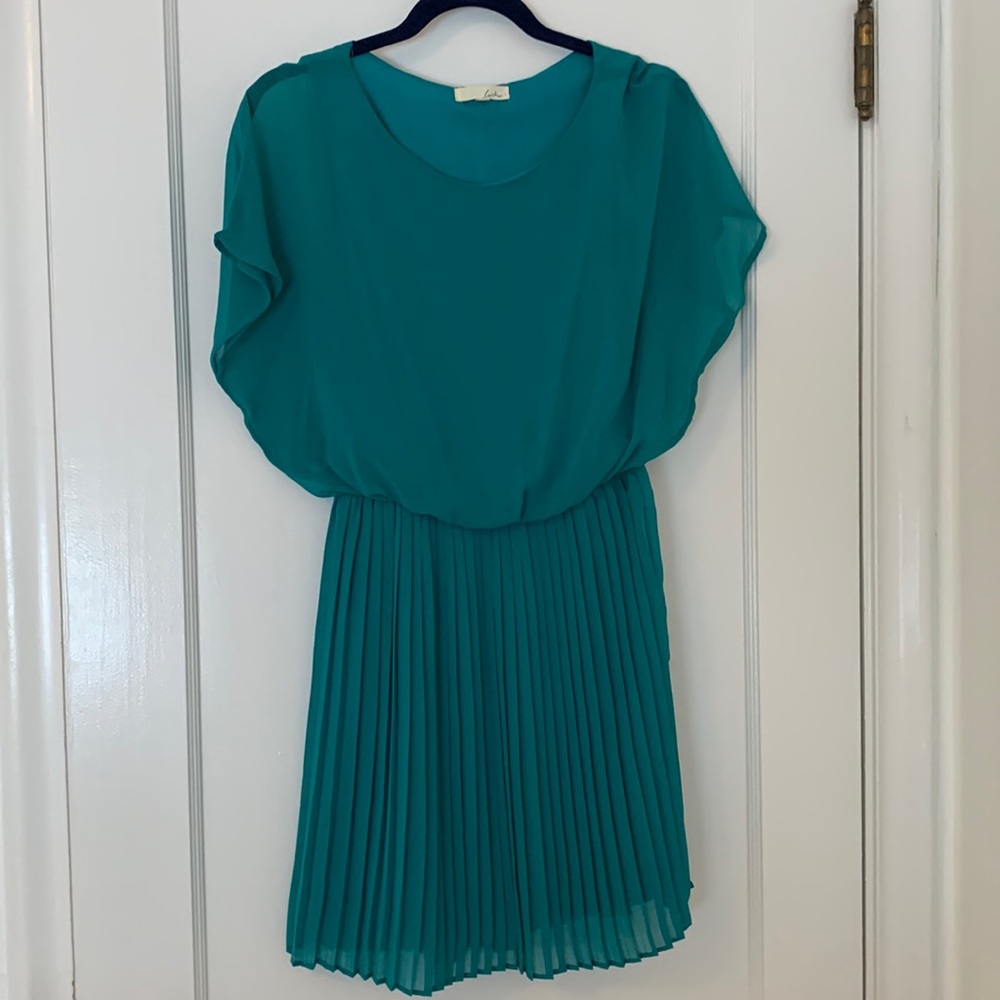 Lush teal dress with pleated skirt